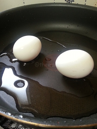 Hard Boiled Eggs: Step 1 eggs into fry pan