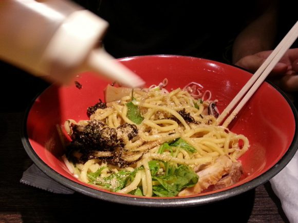 abura soba pouring vinegar