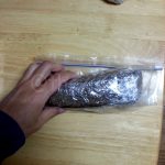 3. Get the meat out, cover with saran wrap, and put into a ziplock (let all air out).
